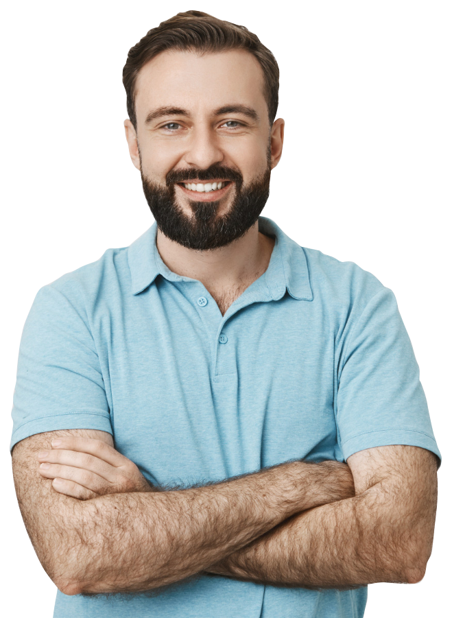 a person standing with cossed arms smilling